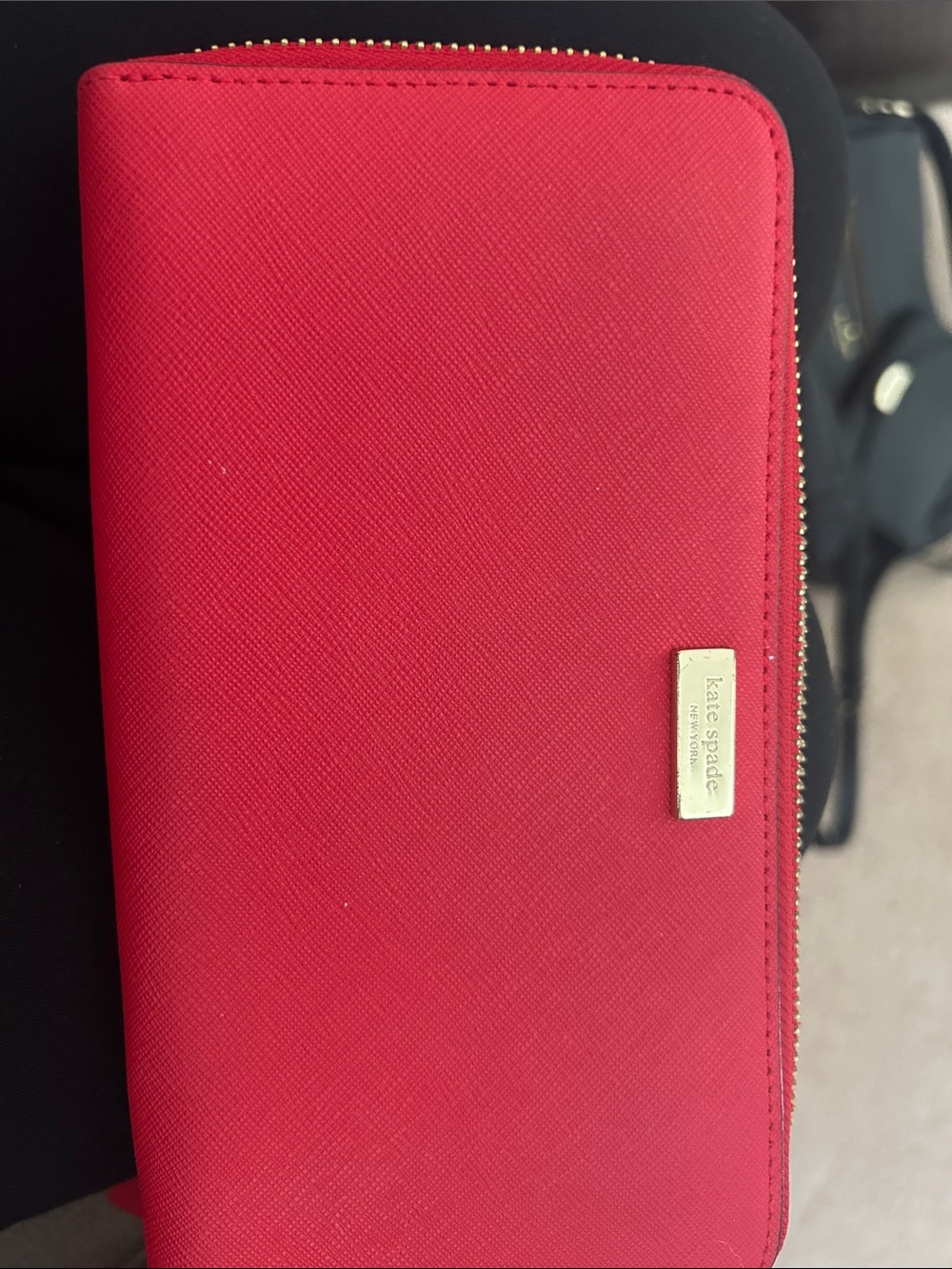 kate spade red zip-around wallet with gold plaque